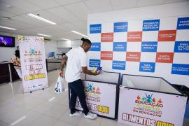 Educação em Movimento professores-atletas retiram kits da corrida de sábado 9.jpeg