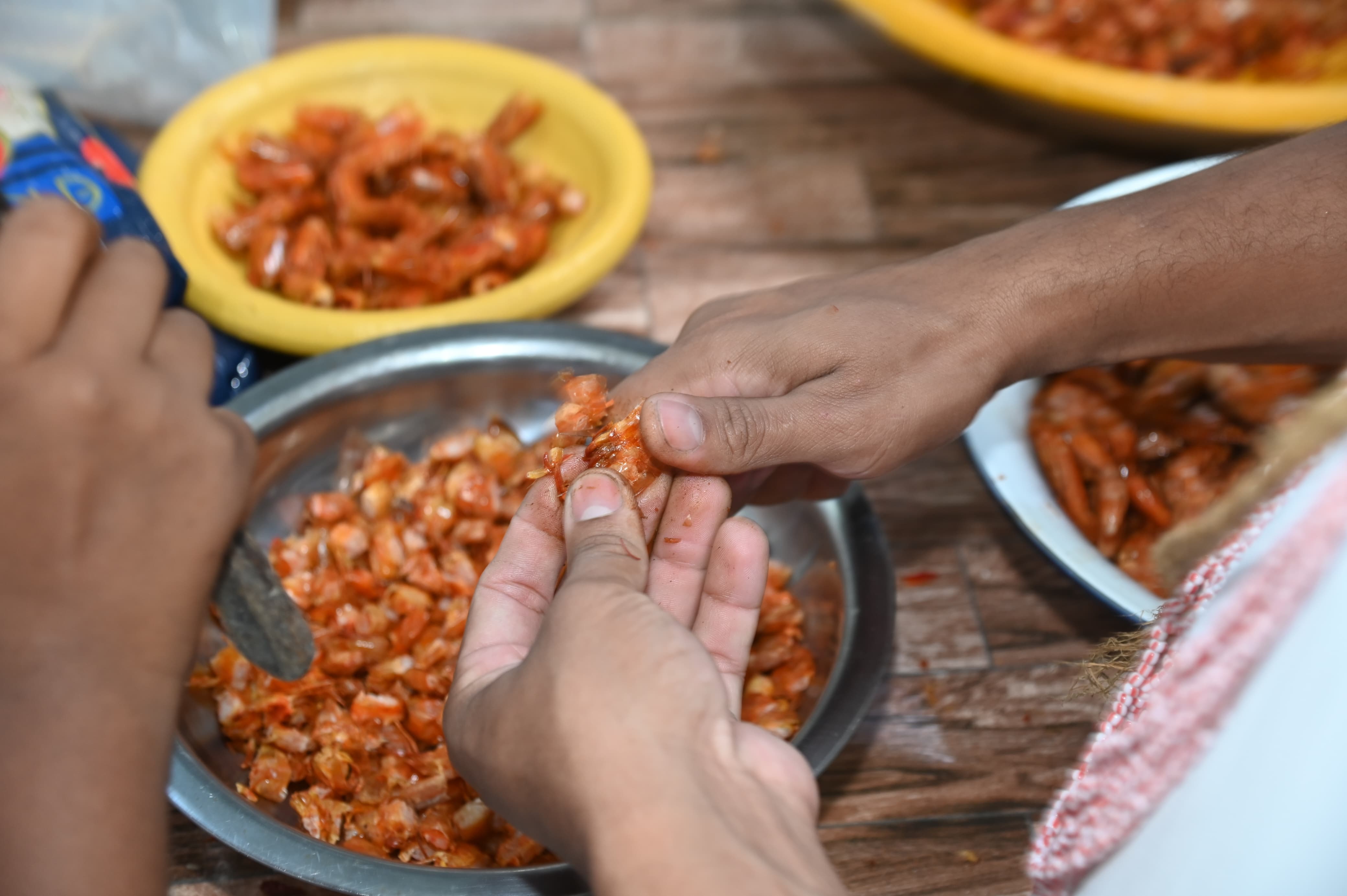 Preparo de caruru de São Cosme e São Damião