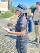 Atividades incluíram a Blitz Lilás e palestra em escola estadual, reforçando o combate à violência contra a mulher