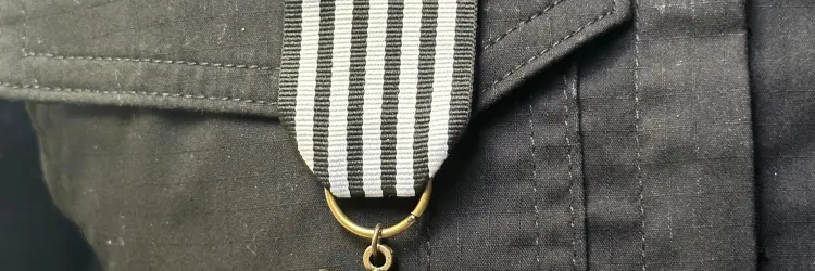 Medalha de mérito recebida pelo servidor.